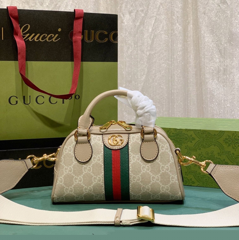 G*u*i top handle bags